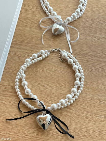 Bold Pearl Ribbon Heart Necklace